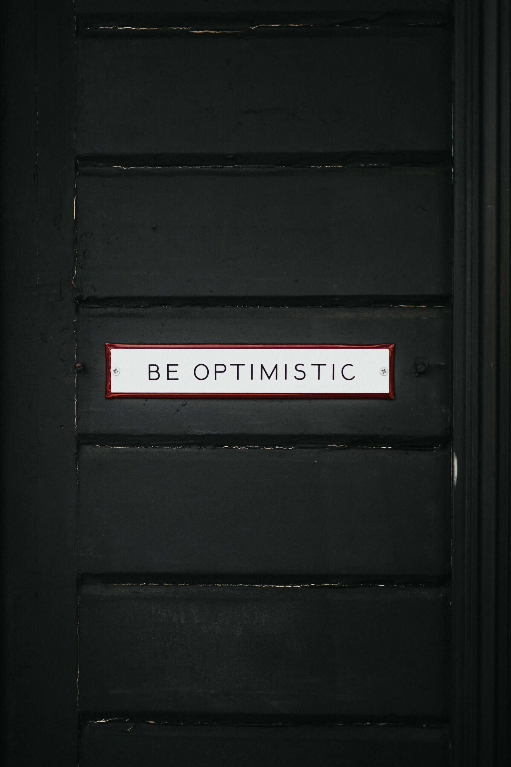 door sign be optimistic